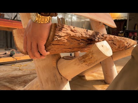 Sophisticated Techniques In Woodworking/A Sturdy Chair From A Tree Trunk Made By A Skilled Carpenter